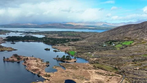 Wild Ireland Kerry mountainside with ring of Kerry in the background dramatic Stock Footage 337009894