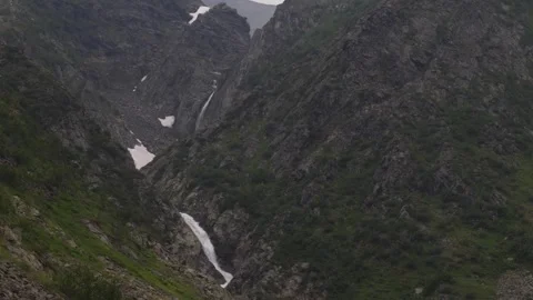 Wild mountain river breaks through the rocks. Ural mountains Stock Footage 269547650