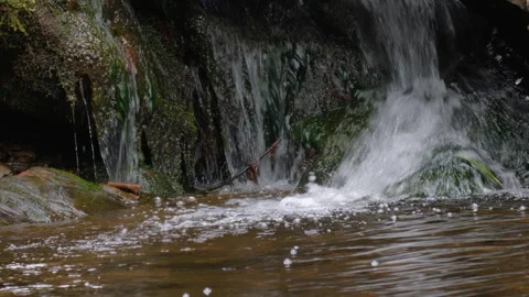 Wild mountain river flowing through stone boulders. Slow motion Mountain ri.. Stock Footage 330789210