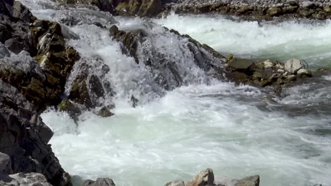 Wild mountain river passing over rocky landscape. Stock Footage 167697209