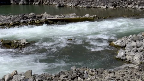 Wild mountain river passing over rocky landscape. Video stock 167697280