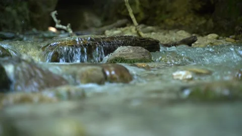Wild mountain river running through stone rapids in carpathians in slow motion Stock Footage 173670948