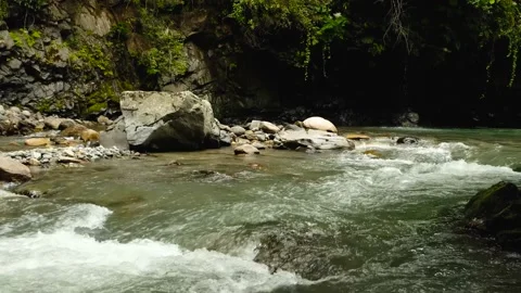 Wild mountain river running through stone rapids in Georgia in slow motion Stock-Footage 198659044