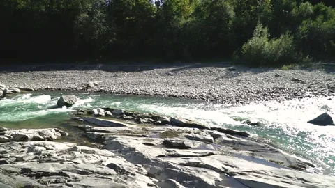 Wild mountain river running through stone rapids in carpathians in slow motion Stock Footage 233413836