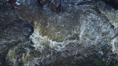 Wild mountain river, top view, flowing through stone boulders, river with clear Stock Footage 254068294