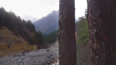Wild Nature of North Caucasus Serene River Valley and Majestic Mountain Landscap Stock Footage 320851908
