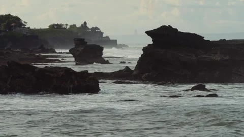 Wild Ocean Surges Collide With Steadfast Stone Formations During Storm Stock Footage 336133213
