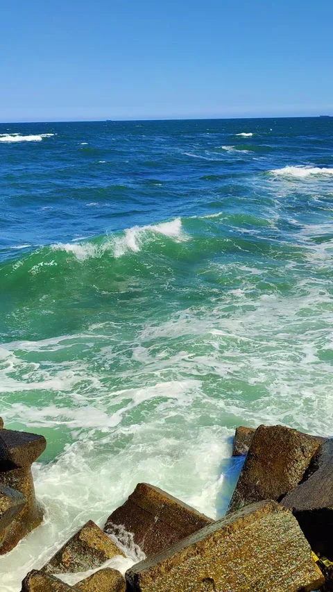 Wild Ocean Waves Crashing Ashore in Summer Stock Footage 309482293