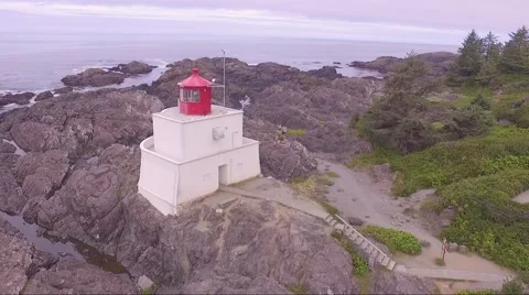 The Wild Pacific Trail- Ucluelet Lighthouse Aerial  1 Stock Footage 65389963