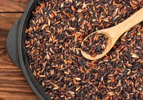 Wild rice in pan Stock Photos