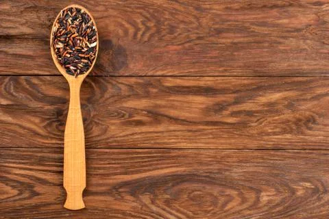 Wild rice in spoon Stock Photos