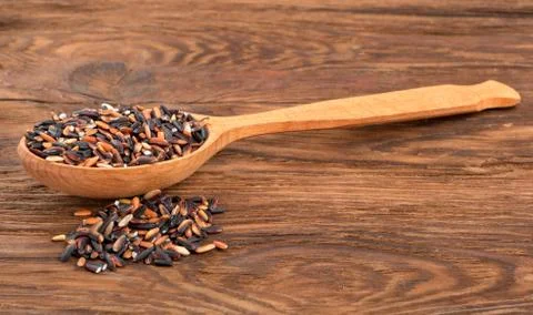 Wild rice in spoon Stock Photos