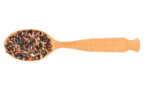 Wild rice in a spoon Stock Photos