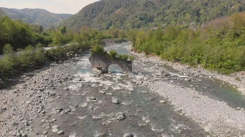 Wild river and a collapsed bridge 動画素材 95930409