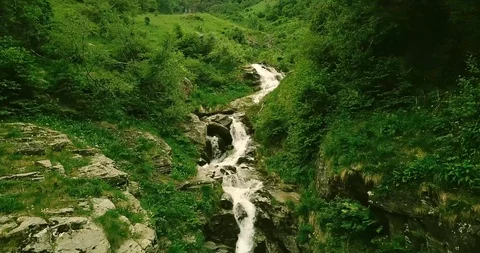 A wild river becomes a waterfall in the Pyrenees Stock Footage 93000839