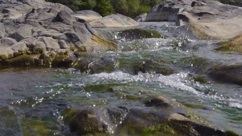 Wild river between rocks forms a beautiful natural waterfall stream Stock Footage 115443571
