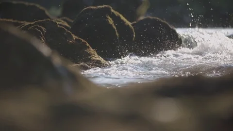 Wild river hitting mossy rocks 스톡 동영상 76555416