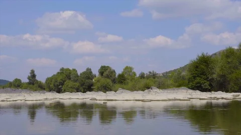 Wild river in mountains and forest forms a beautiful natural stream Stock Footage 115443155