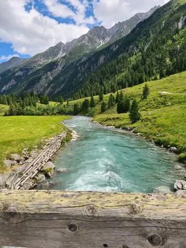 Wild river rushing down on the rocks Stock Photos