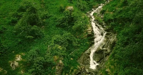 Wild river stream among meadows and stone Video stock 94497688
