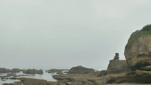 Wild rocky beach overcast at the cloudy day Stock Footage 95538468