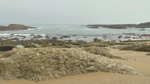 Wild rocky beach overcast at the cloudy day Stock Footage 95543877