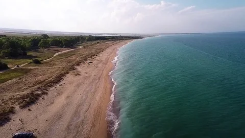 A wild romantic beach looking through the bird's eye view Stock Footage 81295723