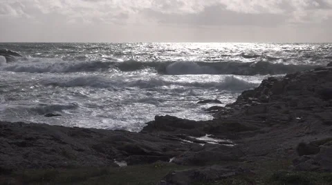 Wild sea at sunset Stock Footage 61553640