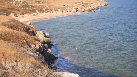 Wild stormy sea bay with cliffs around Stock Footage 79622865