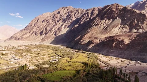 A wild stretch of Ladakh—where serenity hides among peaks and green valleys. Stock Footage 310900053