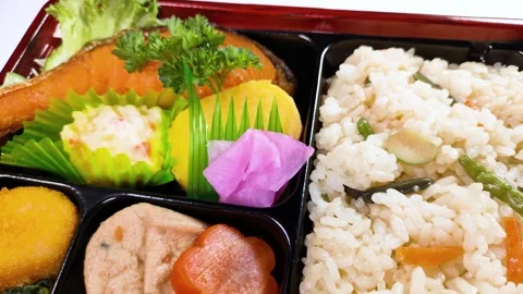Wild vegetable rice lunch box rotating Stock Footage 300750826
