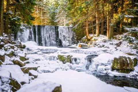Wild waterfall in winter Stock Photos