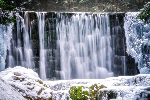 Wild waterfall in winter Wild Waterfall, known as Dziki Wodospad, in beaut... Stock Photos