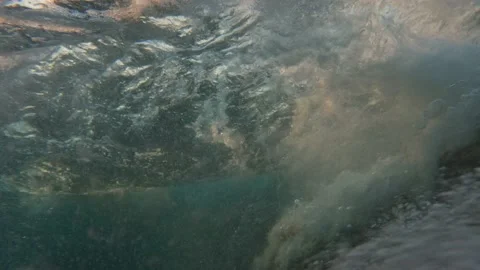 Wild wave breaking over the camera in super slow motion Video stock 228856943
