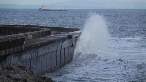 Wild waves breaking in the atlantic coast breakwater Stock Footage 88576201