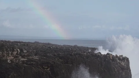 Wild waves breaking in the atlantic coast with rainbow in slow motion Stock Footage 88946319