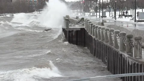 Wild waves breaking crashing into shore in hurricane force wind storm Stockbeeldmateriaal 147644948
