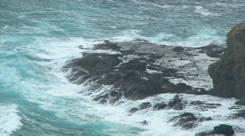 Wild waves crash over rocks Stock Footage 39590849