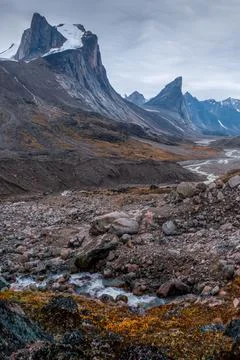Wild Weasel river winds through remote arctic valley of Akshayuk Pass, Baffin Stock Photos