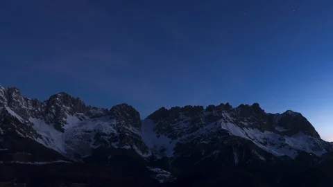 Wilder Kaiser Mountain range night to day time lapse Stock Footage