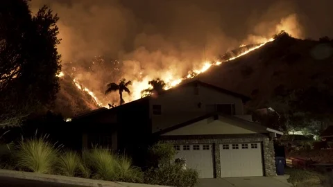Wildfire Burning Behind House Stock Footage
