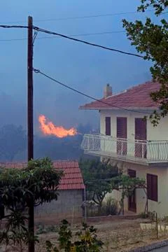 Wildfire close to house Stock Photos