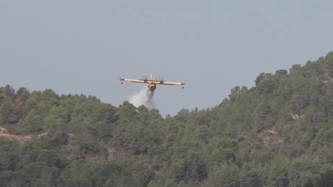 Wildfire in eastern Spain rages as severe weather threatens response efforts, TU Stock Footage 345654121