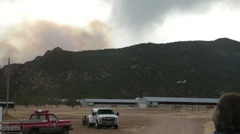 Wildfire jumper plane making pass in Sanpete county fire HD7348 Stock Footage 11365693