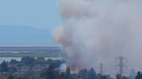 Wildfire Smoke Column Rises Between Transmission Towers Above San Pablo Bay 스톡 동영상 342462138
