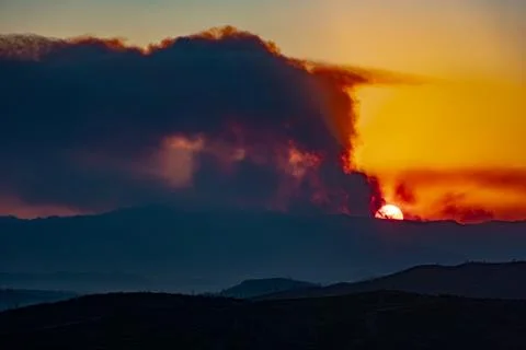 Wildfire smoke sunset Stock Photos
