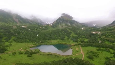 Wildlife. Reflection of mountains in the lake. mirror Stock Footage 72598433