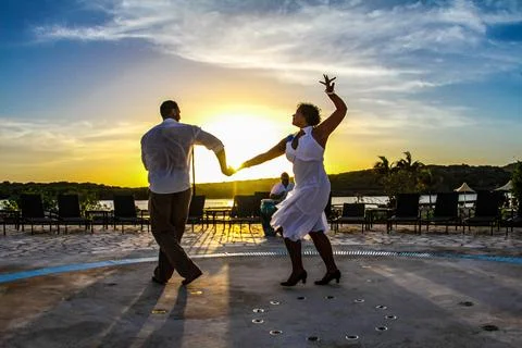 WILLEMSTAD, CURACAO - Apr 14, 2011: A black couple dancing the rumba during s Stock Photos