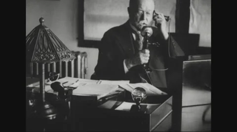 William Cox Redfield talking over telephone Stock Footage