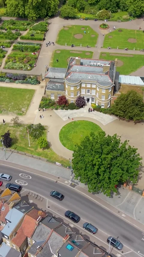 William Morris House vertical reverse rise in Walthamstow revealing Forest Stock Footage 336848133